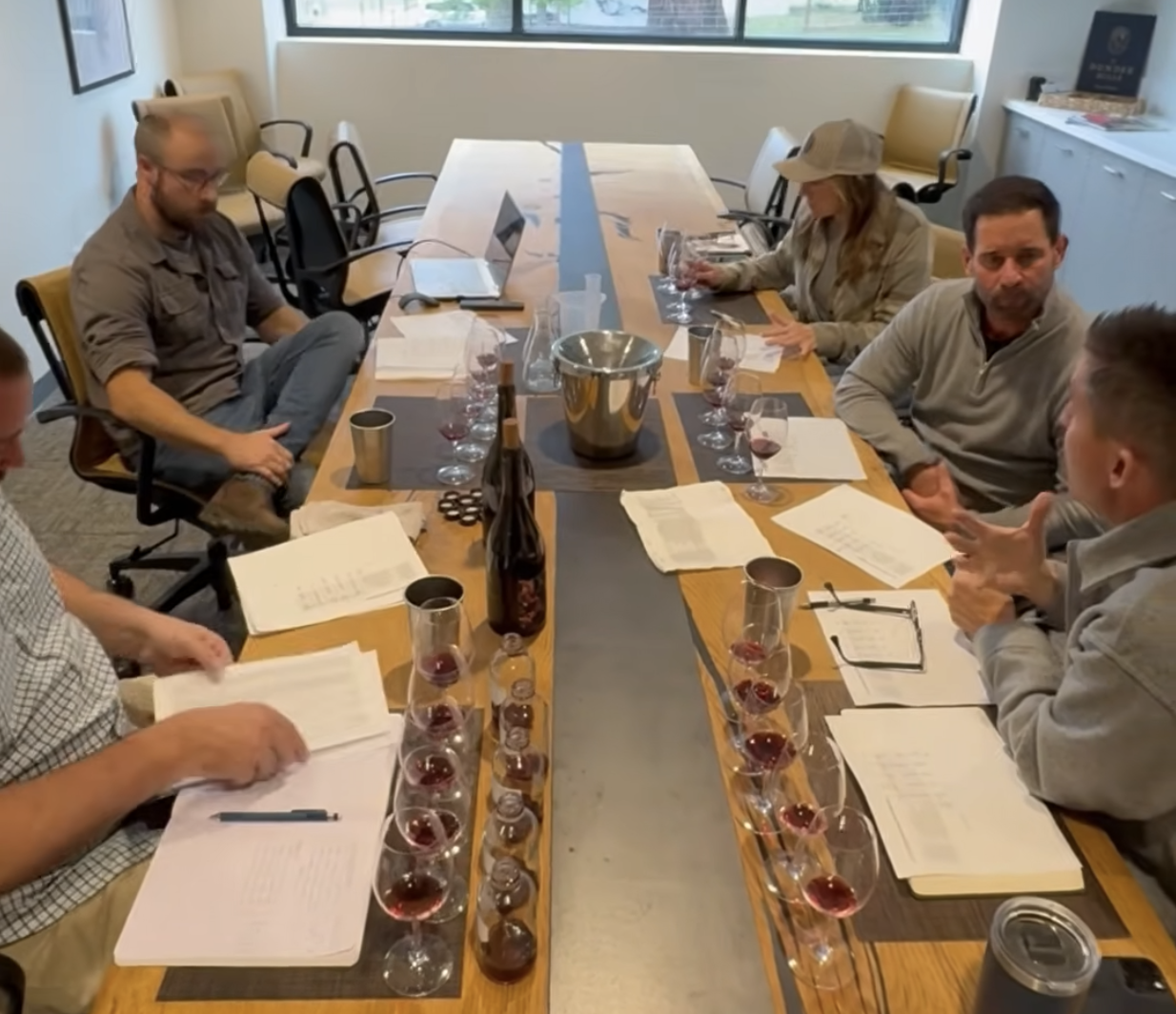 Tasting samples of Pinot Noir on a table.