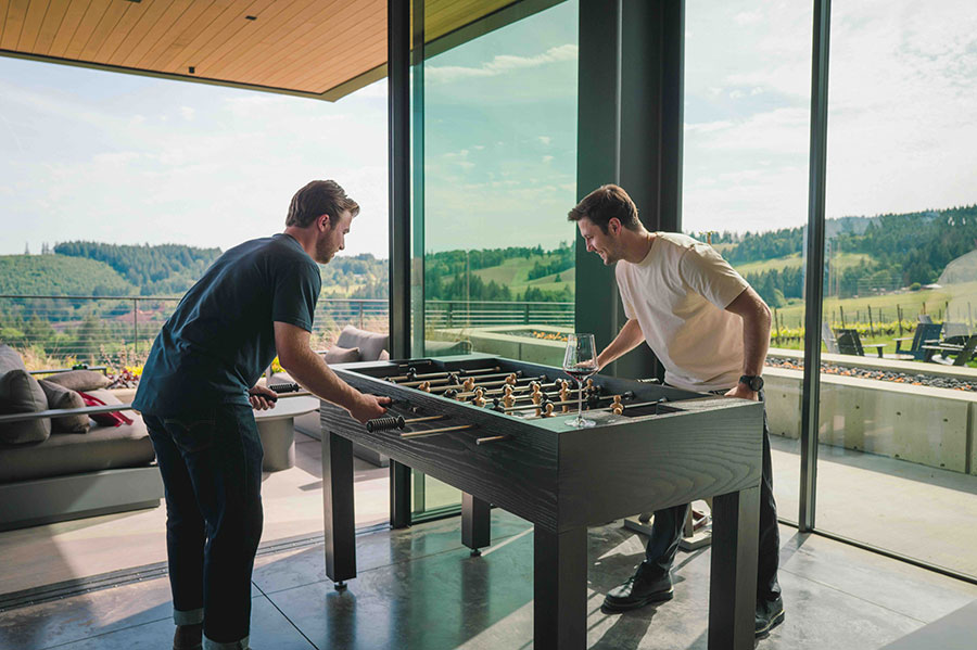 Foosball Two guests playing Foosball in the rec room.